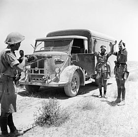 280px-A_British_infantryman_takes_the_surrender_of_the_crew_of_an_enemy_supply_truck_in_the_Western_Desert,_2_June_1942._E12810